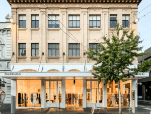 Front of 265 Rundle Street, showing Art Deco architectural design with softly lit tenancy on ground floor.