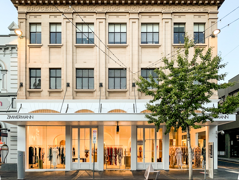 Front of 265 Rundle Street, showing Art Deco architectural design with softly lit tenancy on ground floor.