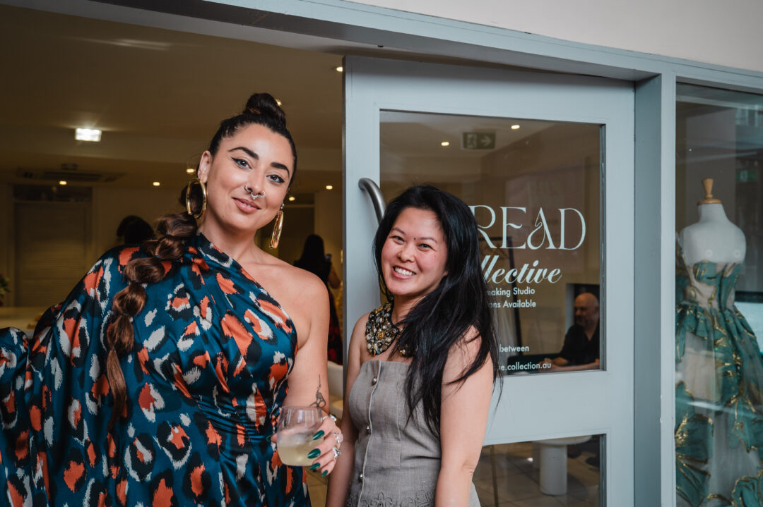 Founders Luiza Aureliano & Hue Le outside Thread Collective.