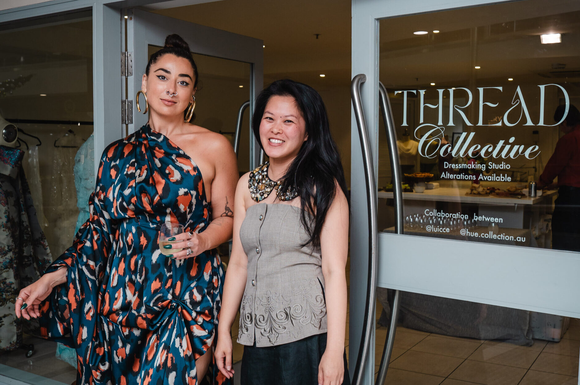 Co-founders Luiza Aureliano and Hue Le outside their space, Thread Collective